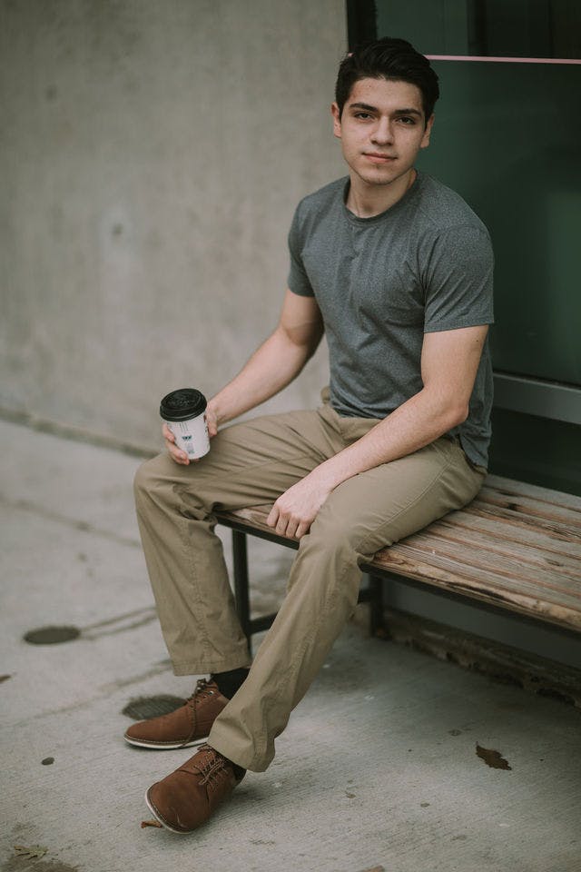 Dating profile photo with coffee, taken by The Match Artist