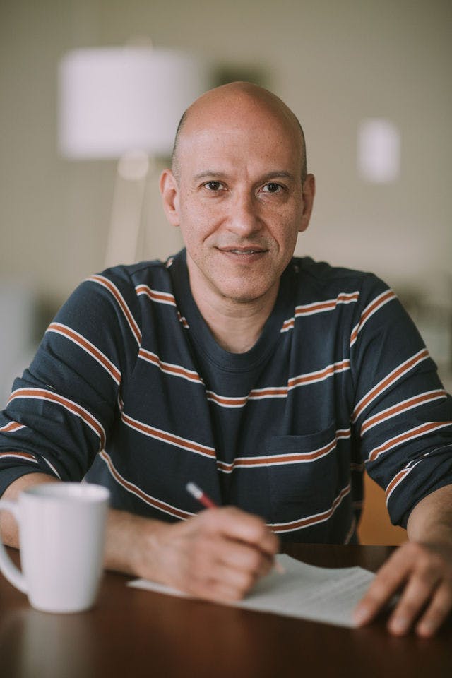 Dating profile photo with coffee, taken by The Match Artist