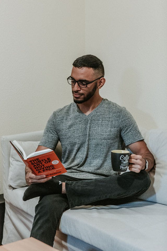 Dating profile photo with coffee, taken by The Match Artist