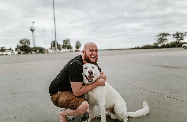 Dating photo with a dog, taken by The Match Artist