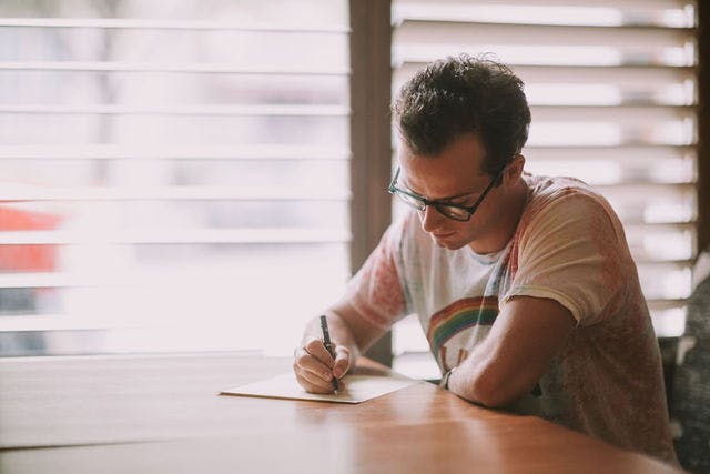 Dating profile photo with coffee, taken by The Match Artist