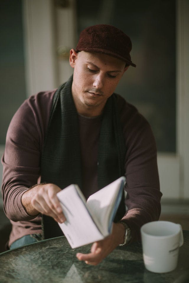 Dating profile photo with coffee, taken by The Match Artist