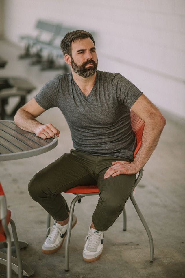 Dating profile photo with coffee, taken by The Match Artist